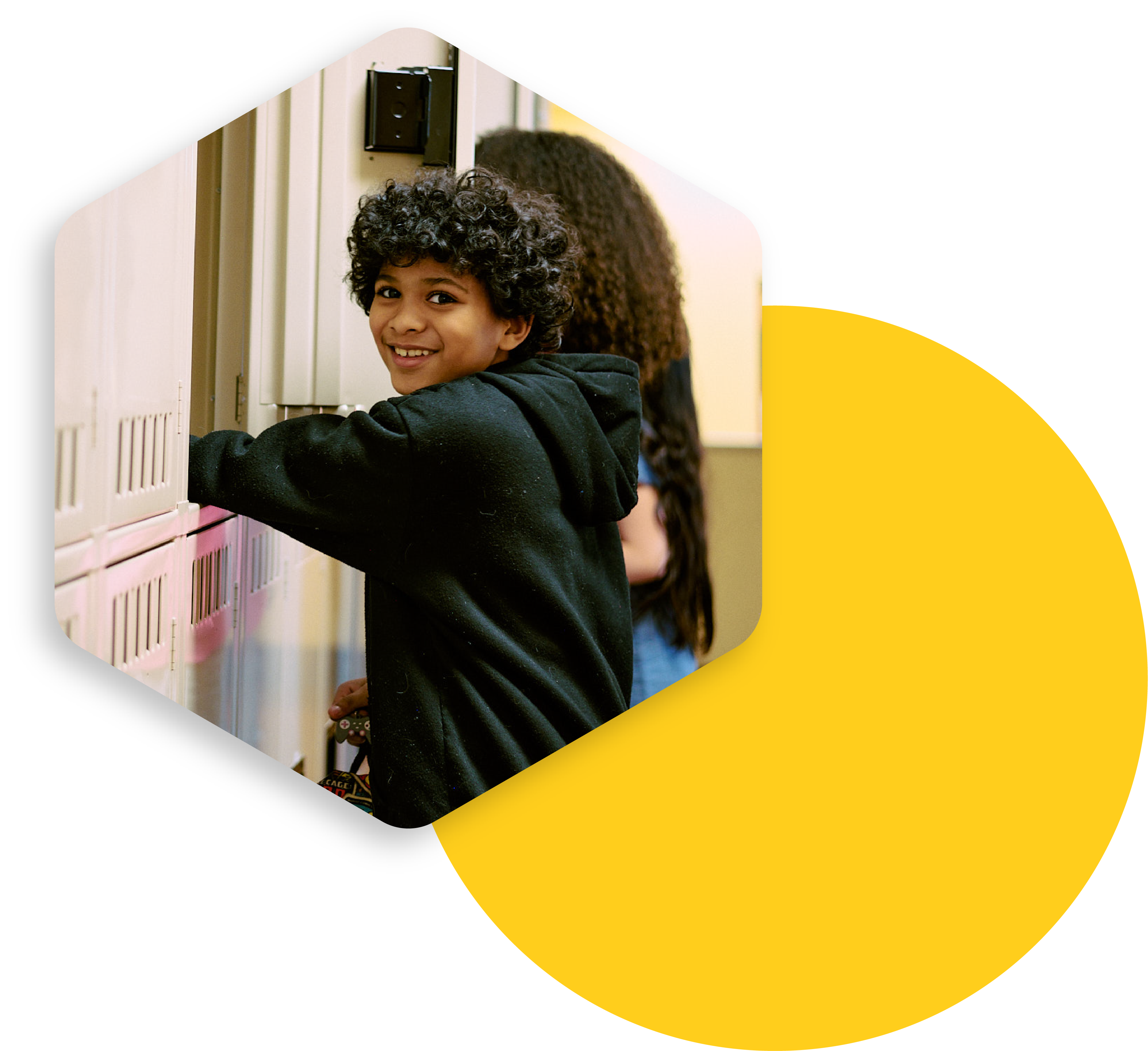 Boy in front of locker at school